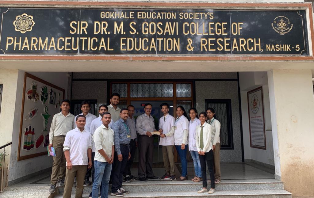 Contributions from Teaching and Non-teaching staff, All year students of B. Pharm for Kolhapur -Sangli relief fund cheque handover to Principal.